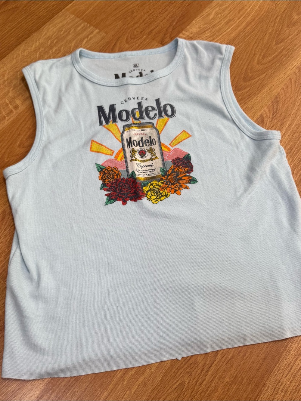 Modelo Light Blue Tank Top with Colorful Can Graphic